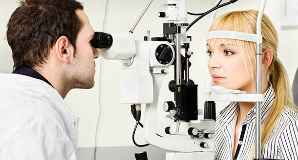 Doctor scanning patient eyes