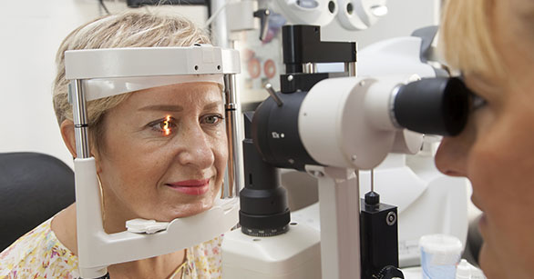 elderly taking cataracts eye exam