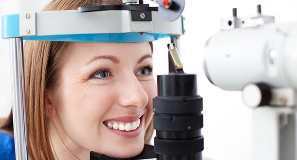 woman happy while scanning her eyes
